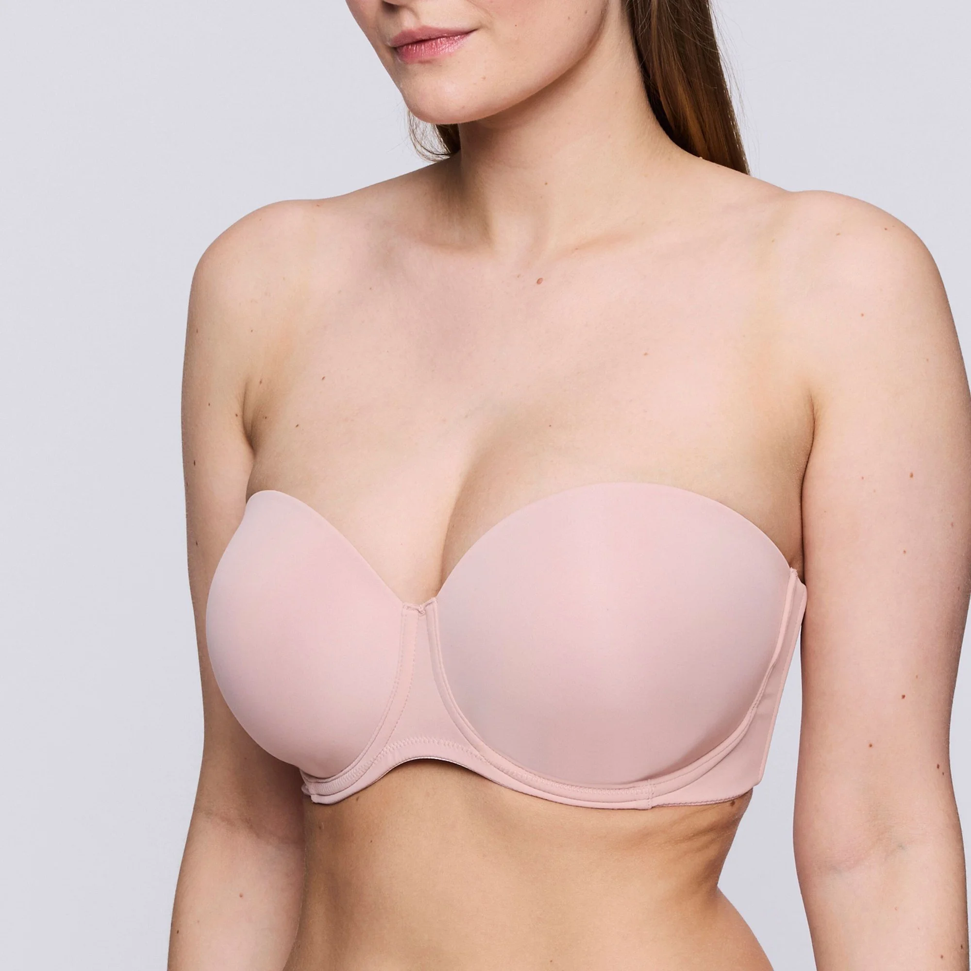 Blush strapless molded bra, close-up three-quarter view