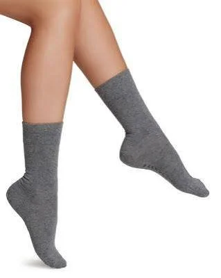 Soft grey ankle socks shown on a model.
