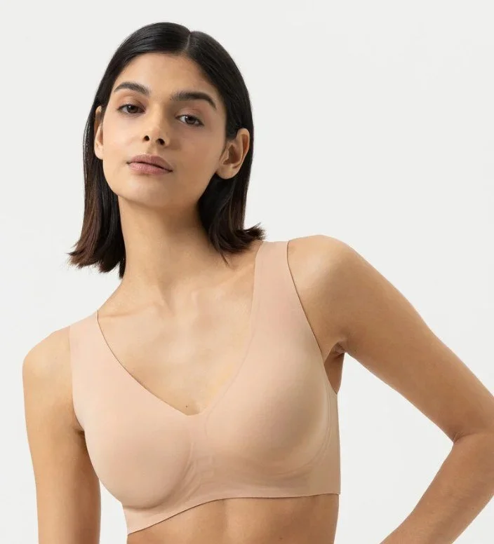 Nude seamless wireless bra with wide straps and smooth band
