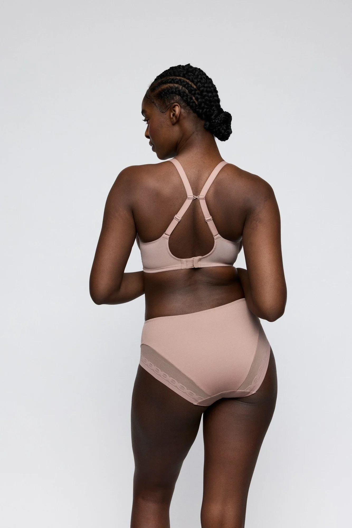 Back view of a mocha high-waist brief with sheer panel and racerback bra