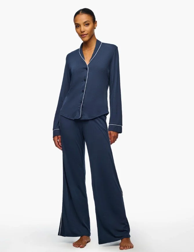 Slate blue long-sleeve pajama set with white piping and wide-leg pants