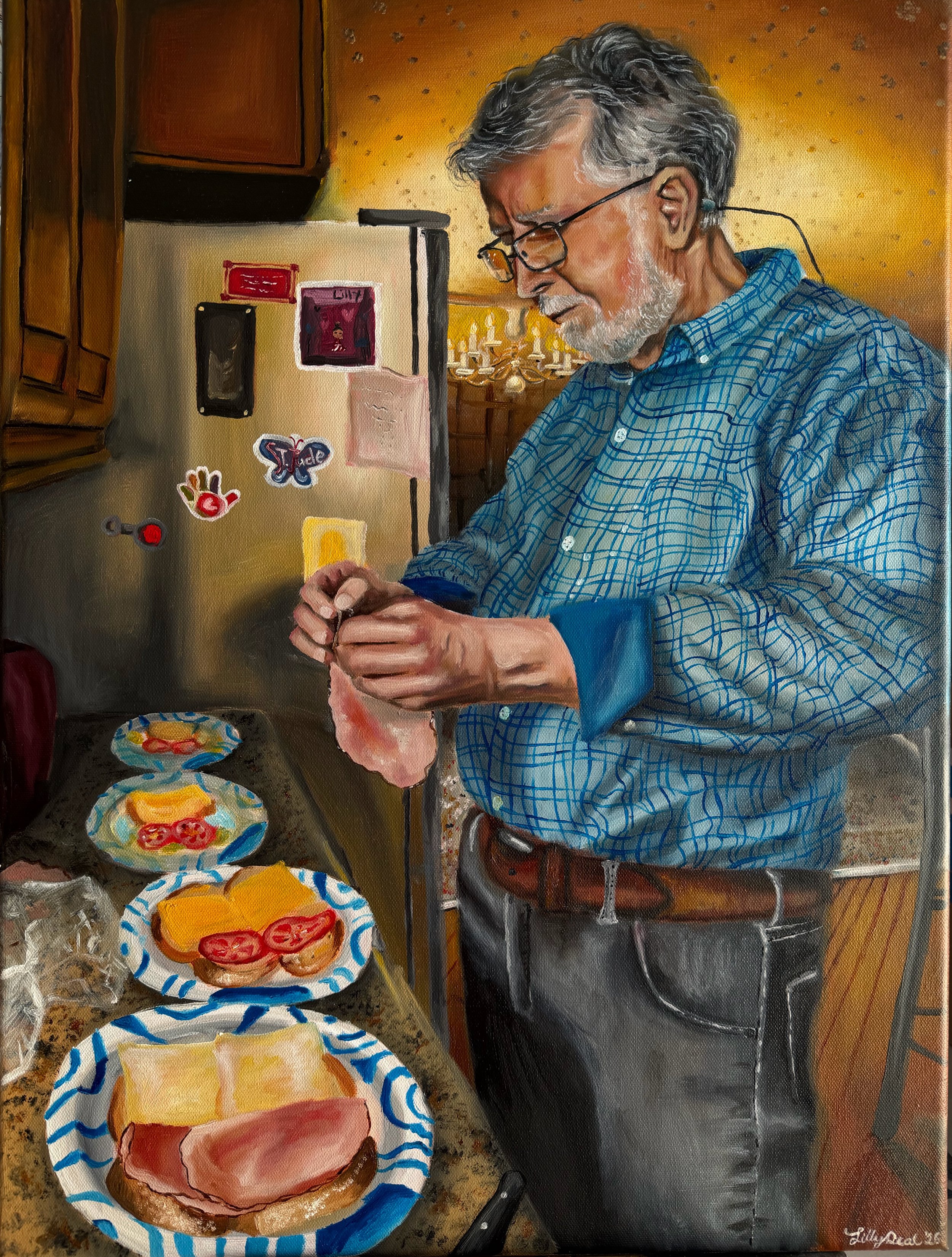 An elderly man with gray hair and a beard, wearing glasses and a blue checkered shirt, preparing food in a kitchen. The countertop has plates with sliced tomatoes, cheese, and cold cuts. The background features a cabinet, a chandelier, and a wall wit