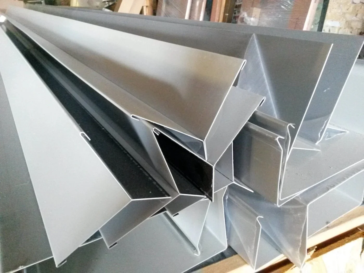 Custom formed brake metal cladding profiles