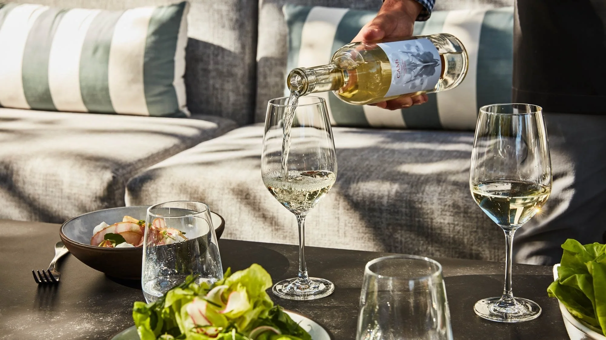 31-Wine-poured-at-an-outdoor-dining-table.jpg