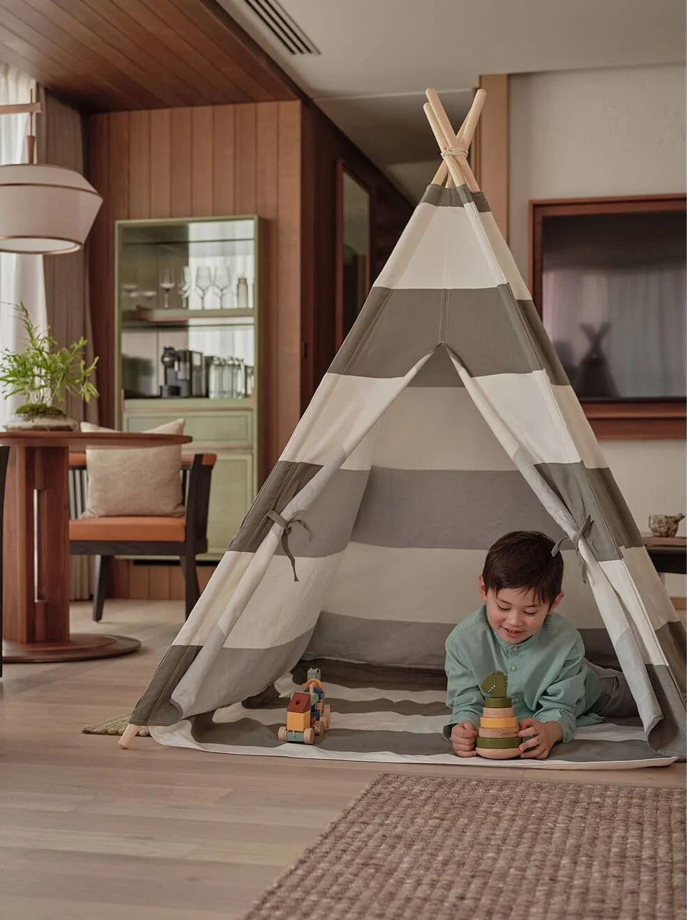 53-child-with-an-in-room-play-tent.jpg