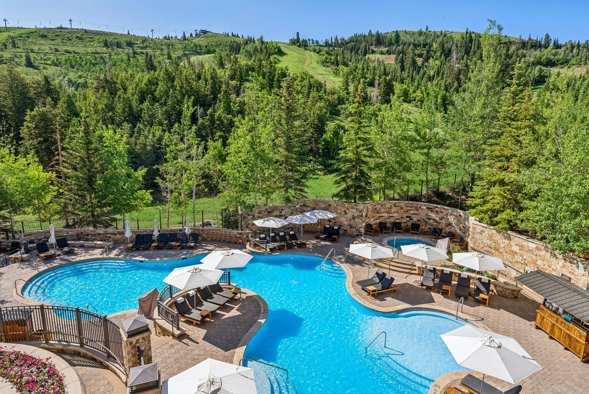23-aerial-view-of-the-split-level-outdoor-pool-in-summer.jpg