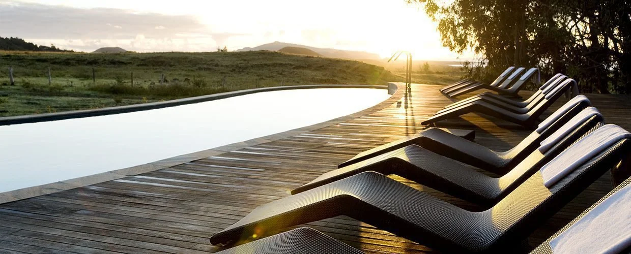 19-outdoor-pool-and-loungers-at-sunset.jpg