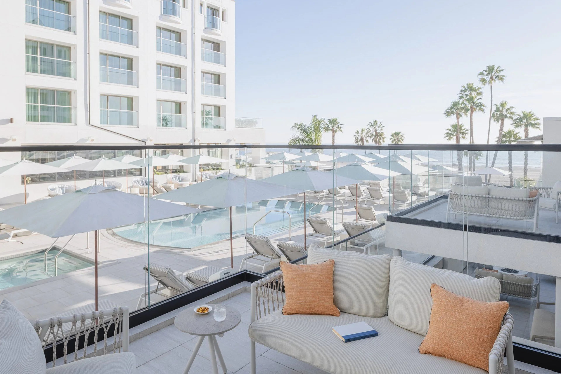 15-poolside-villa-balcony-overlooking-azure-pool.jpg