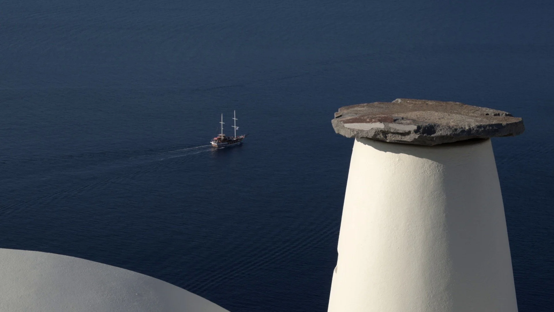 37-boats-on-the-caldera-viewed-from-a-hotel-terrace.jpg