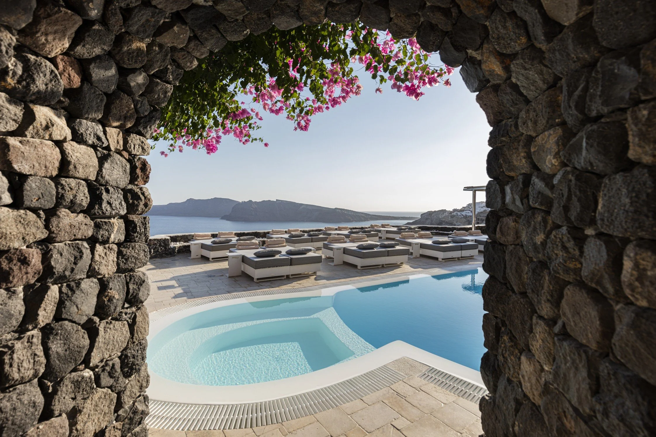 23-main-pool-framed-by-a-stone-arch.jpg