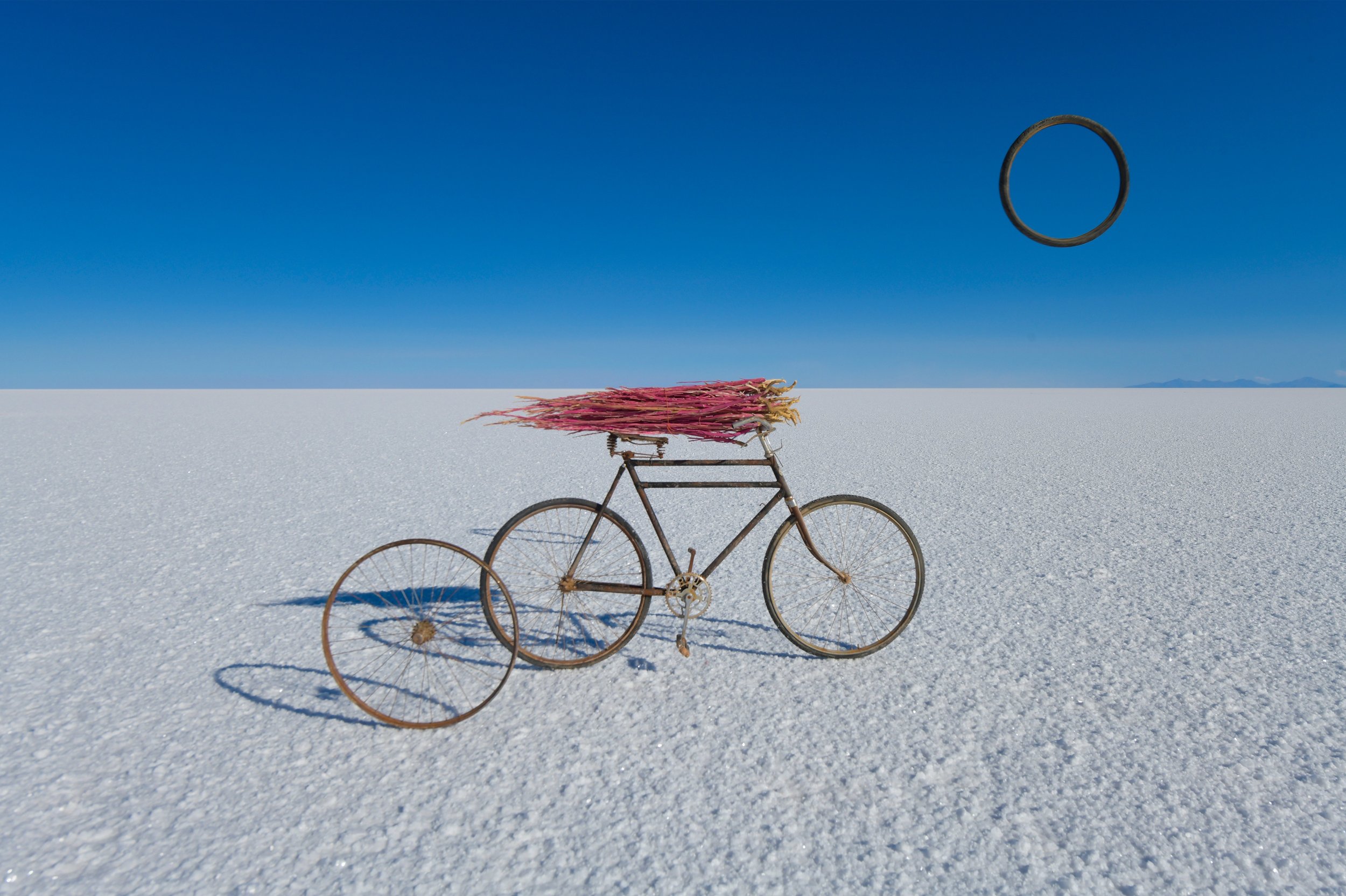29-bicycle-and-suspended-wheel-in-a-salt-flat-composition.jpg