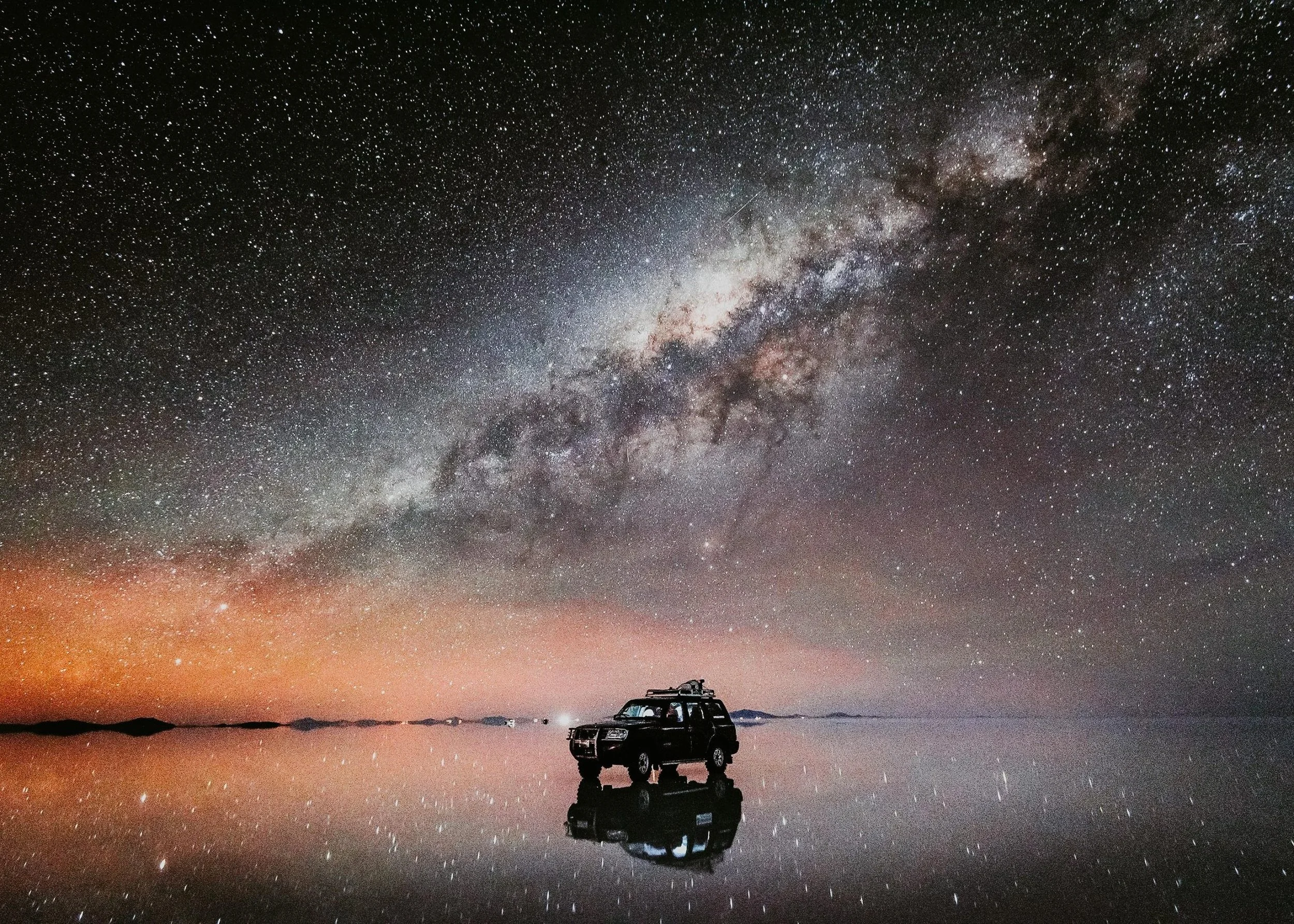 22-night-sky-above-an-excursion-vehicle-on-the-salar.jpg