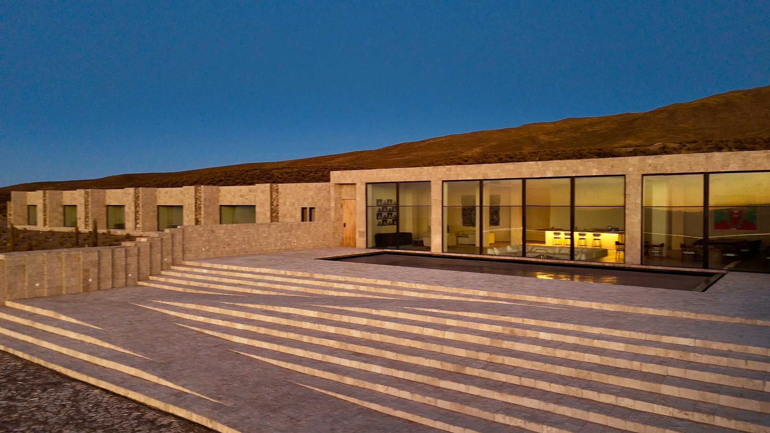 02-oblique-view-of-casa-gast-n-and-its-broad-entrance-steps.jpg