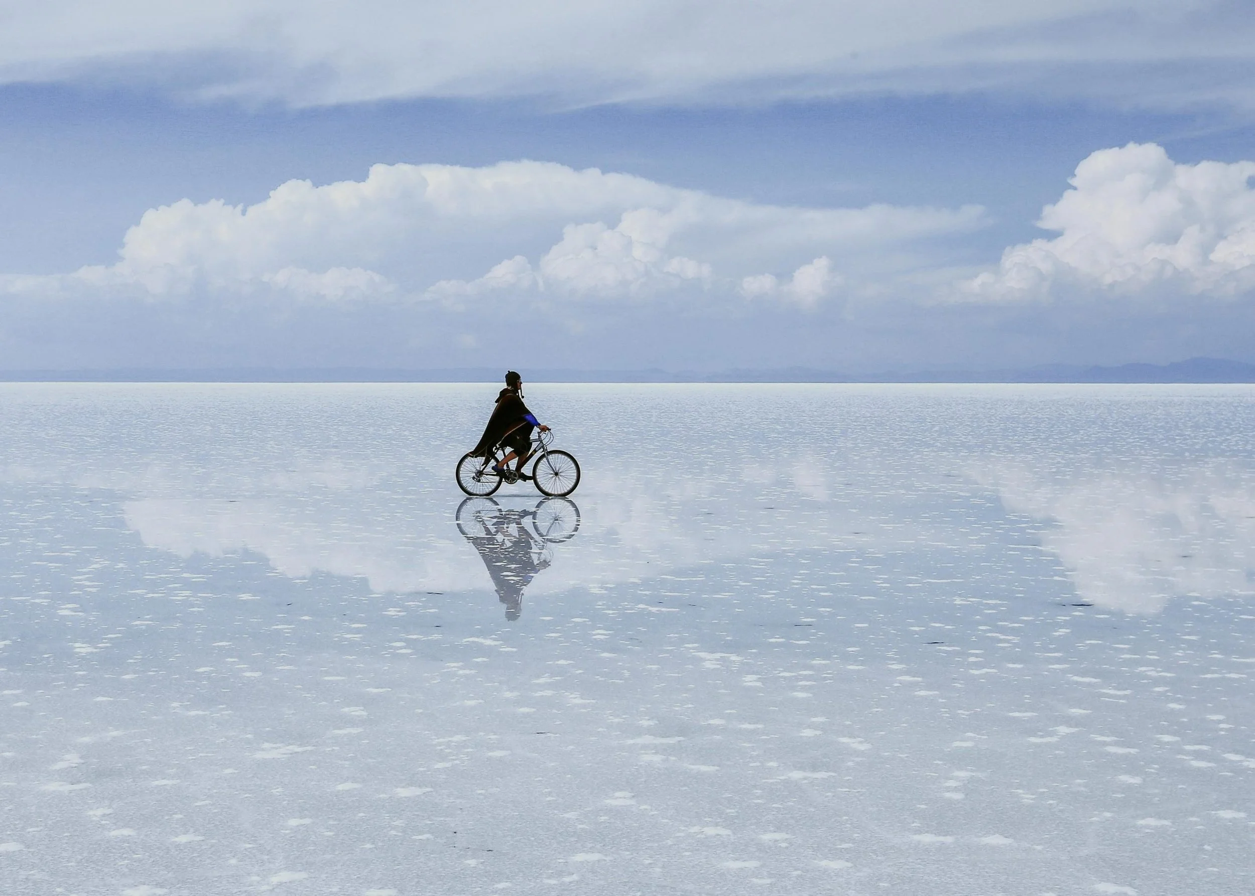 18-cyclist-reflected-on-the-salt-flat-surface.jpg