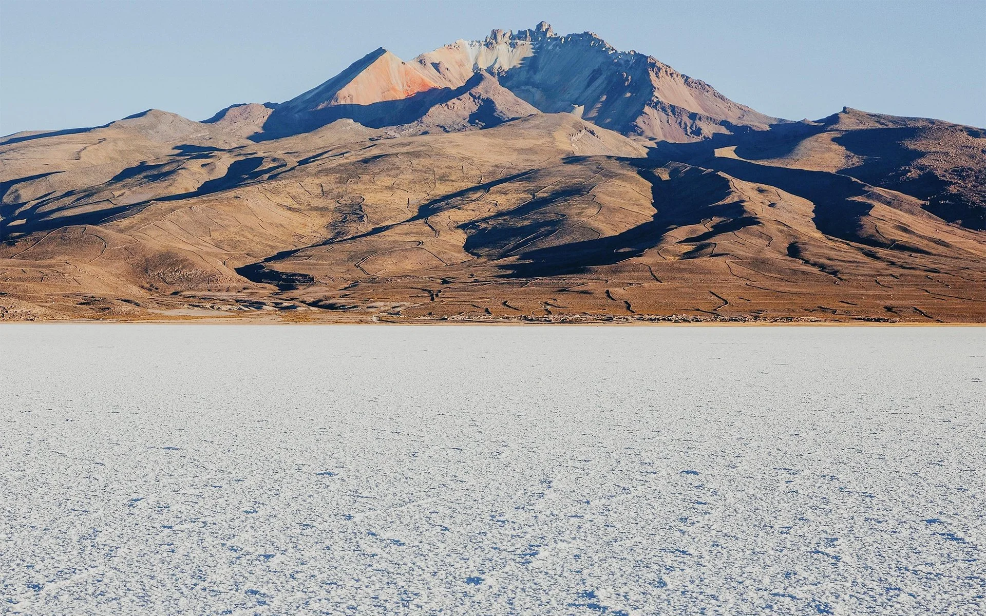 19-tunupa-volcano-beyond-the-white-salt-crust.jpg