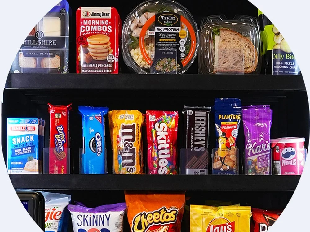 Shelves stocked with snacks and drinks in a SmartMart