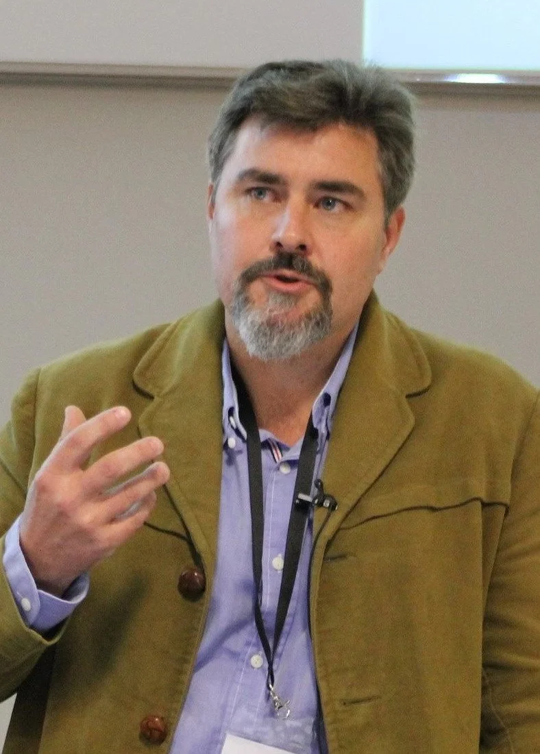Dr Justin Rose speaking at a conference