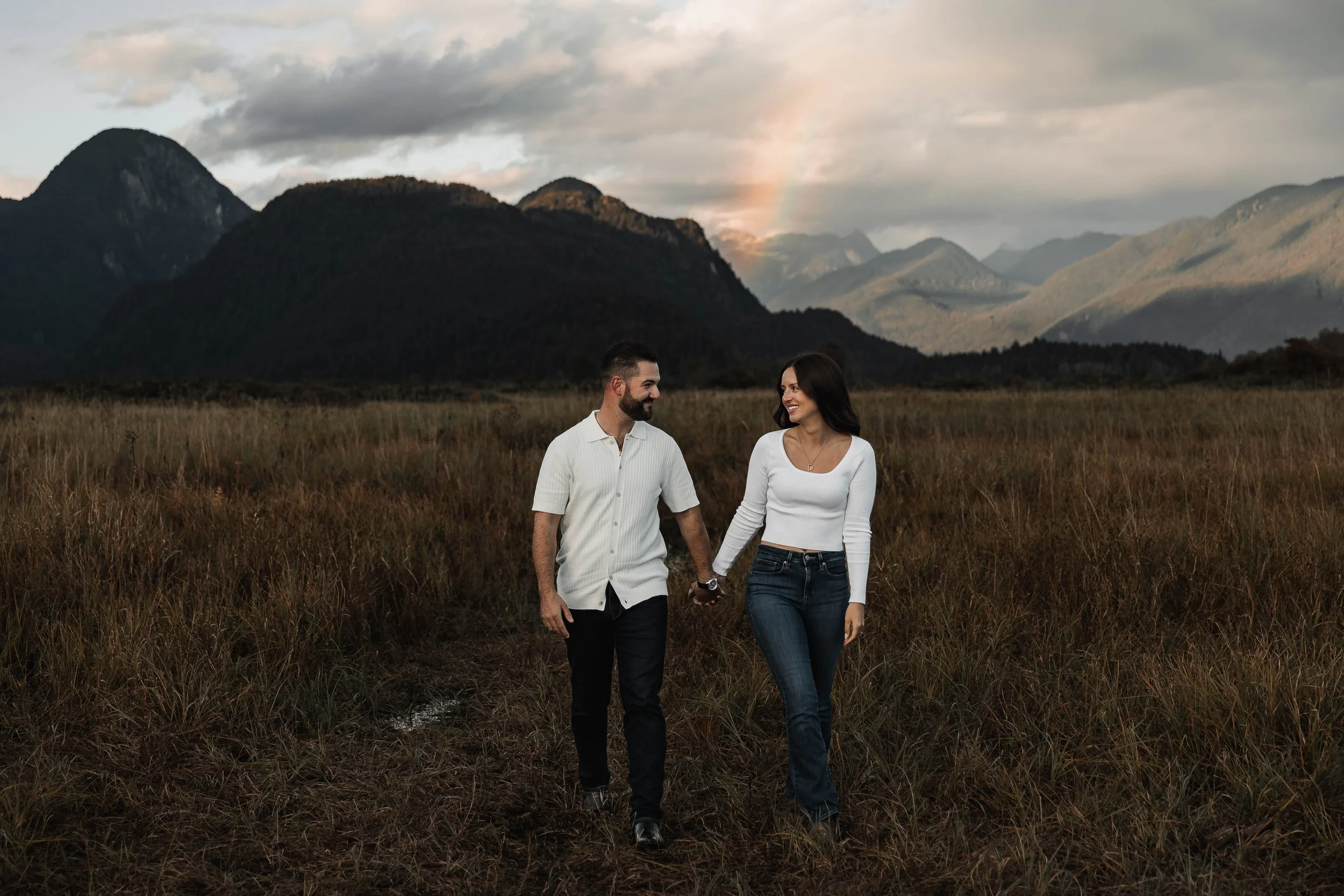 Professional engagement photographer capturing authentic couple moments.