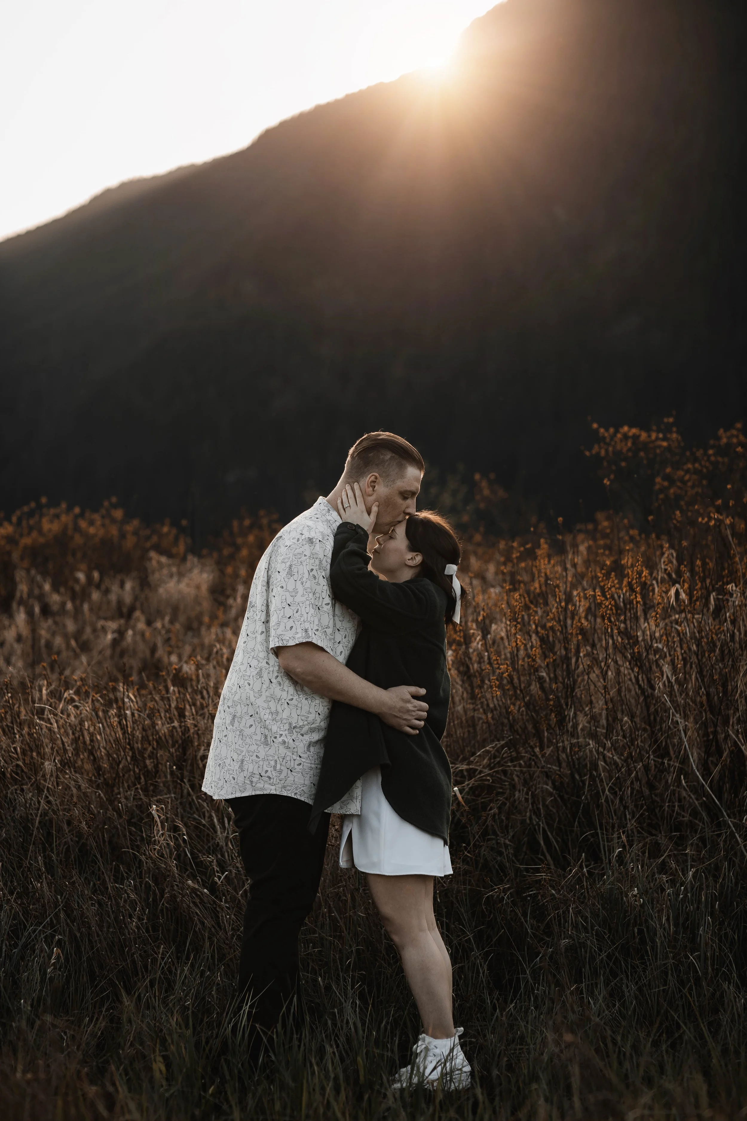 Natural engagement photography with candid moments and romantic portraits.