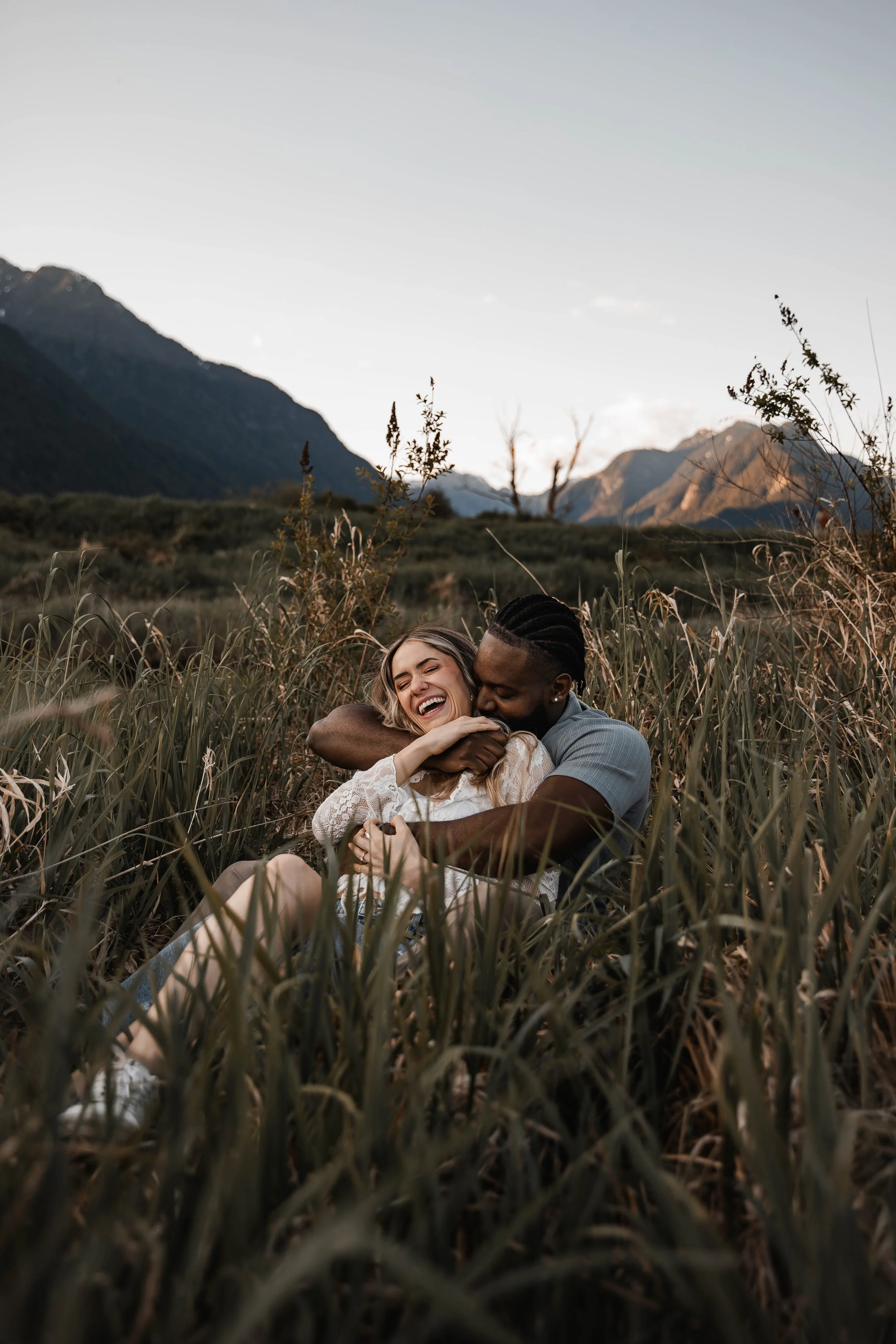 Artistic engagement portraits surrounded by nature at Pitt Lake, British Columbia.
