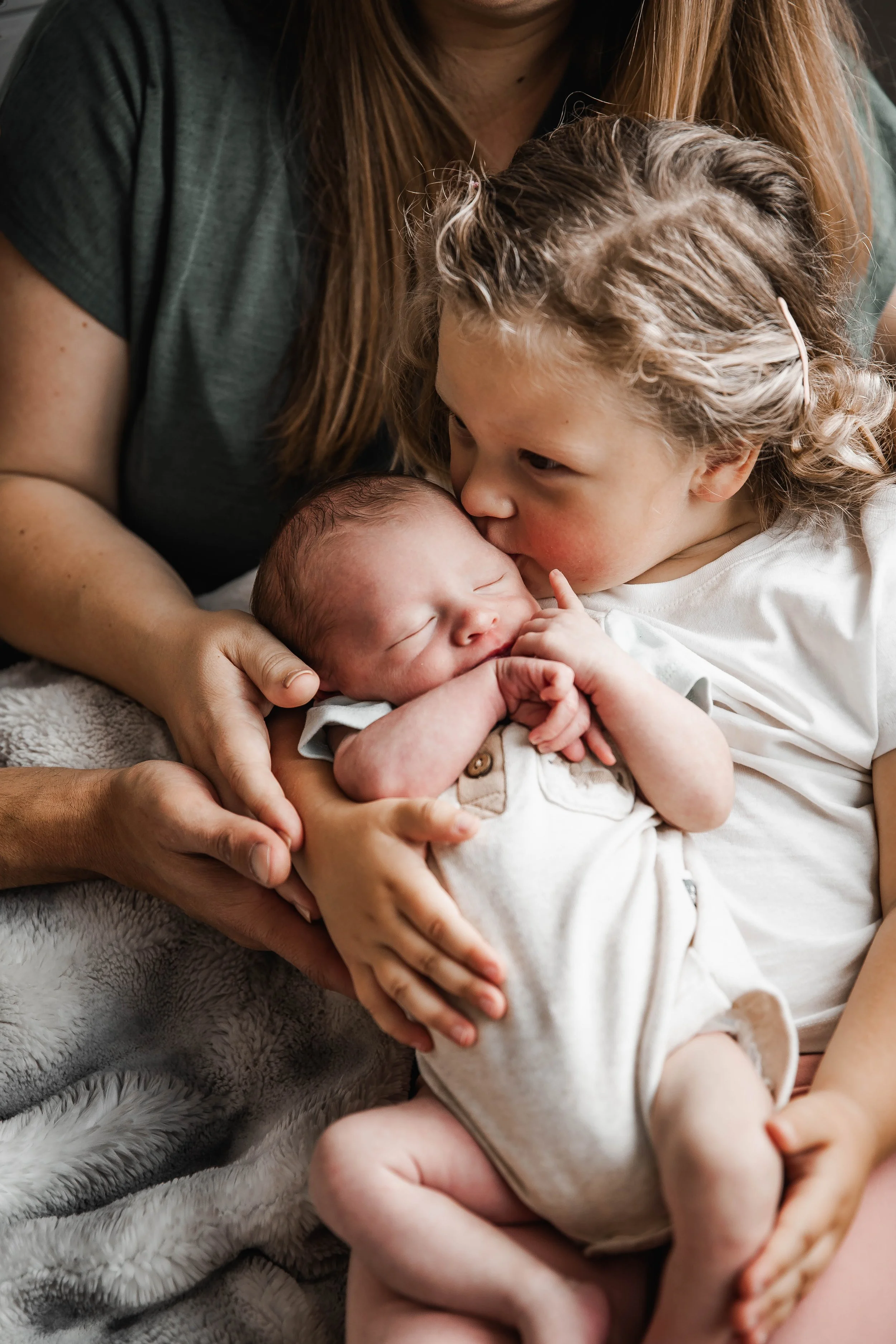 Professional family photographer capturing candid moments with your loved ones.
