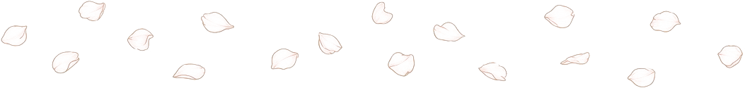 A pattern of small, light-colored, irregularly shaped objects scattered against a black background.