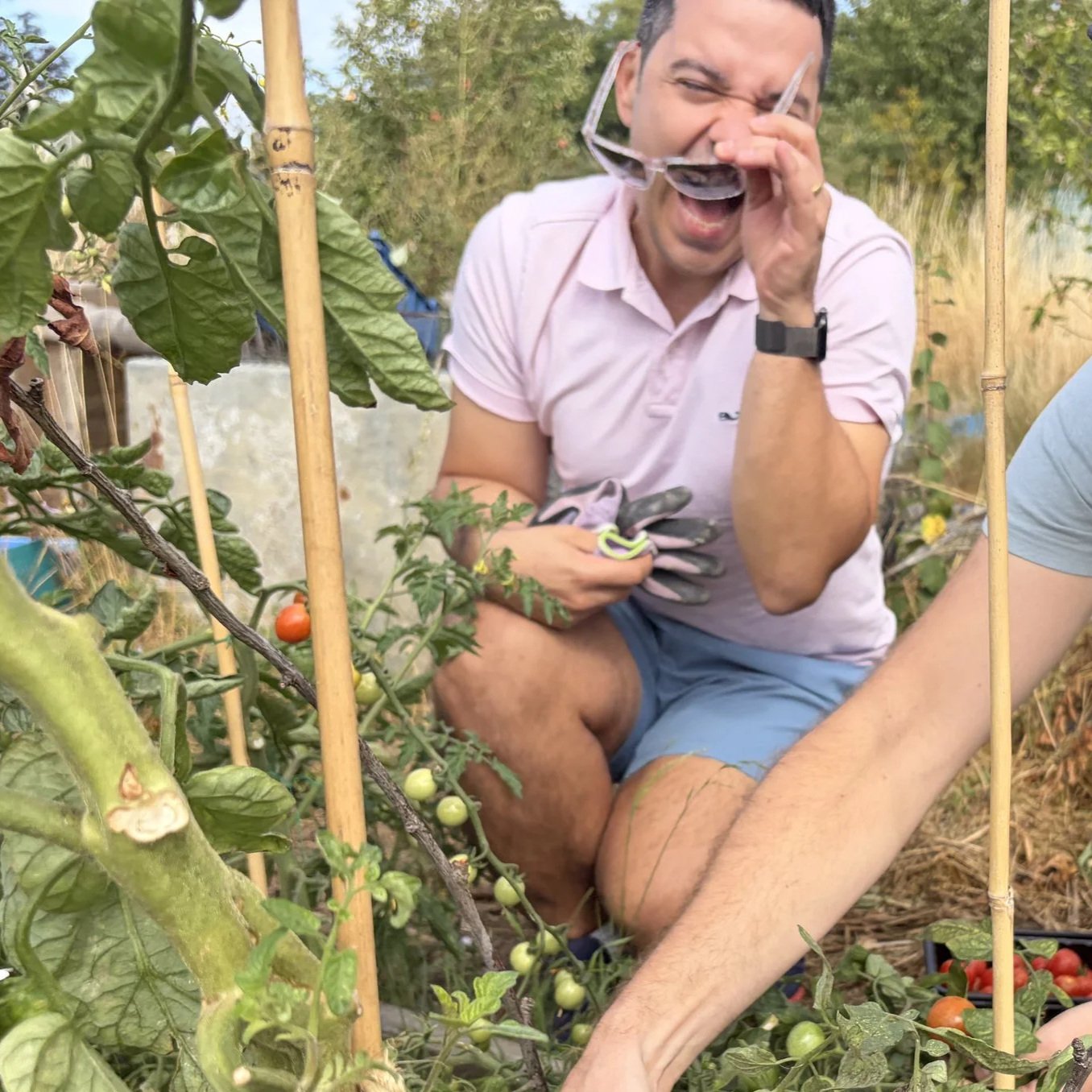 Person laughing in a garden