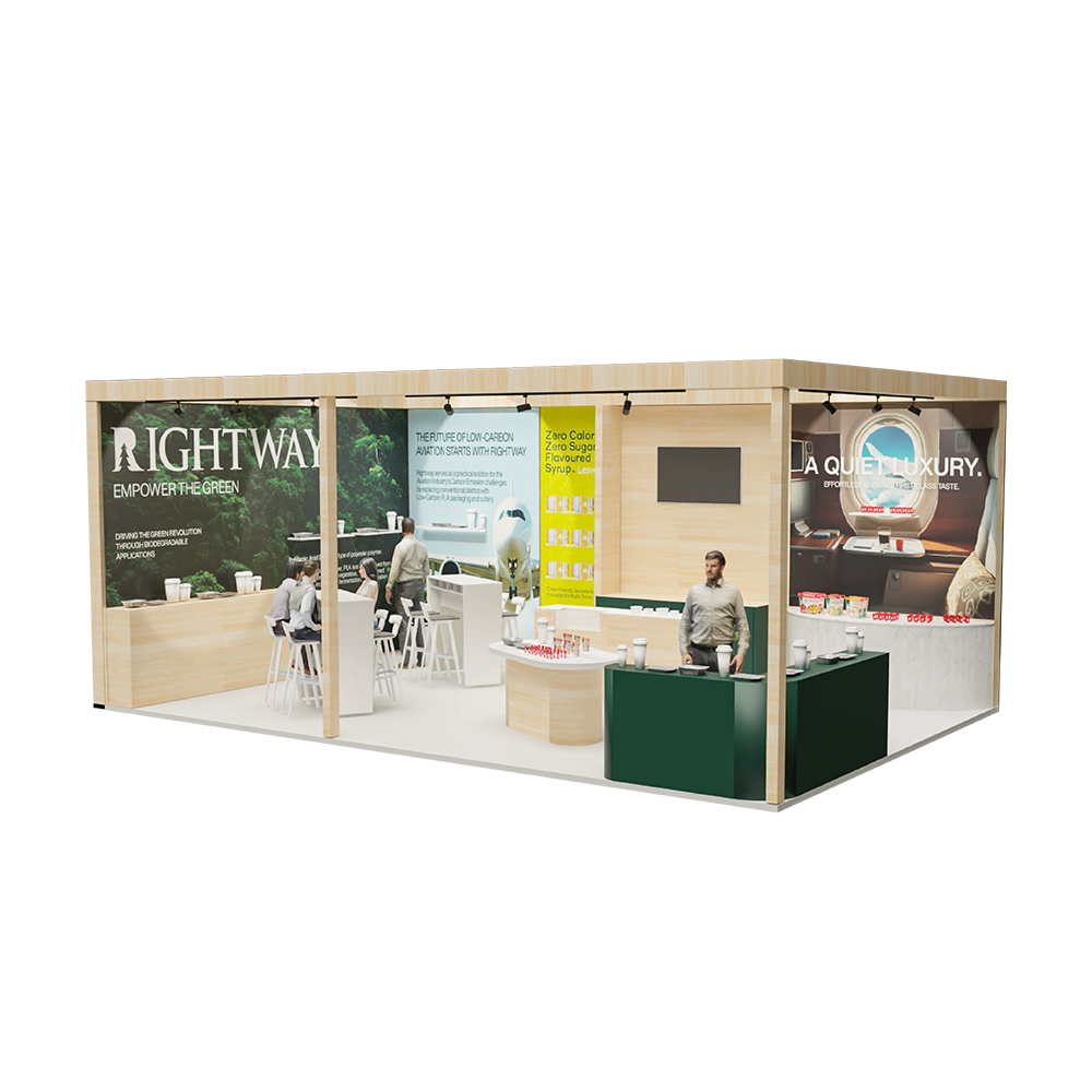 Trade show booth with a white frame, green signage, and a large display screen, featuring people standing inside.