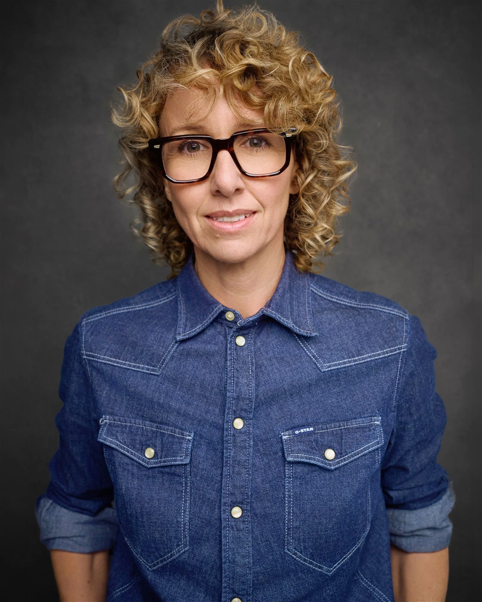 Portrait of Rebecca Lewis, strategic adviser to investment leaders.
