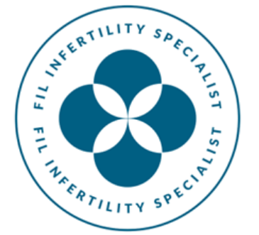 Fertility Specialist logo with a circular design and four blue petal shapes