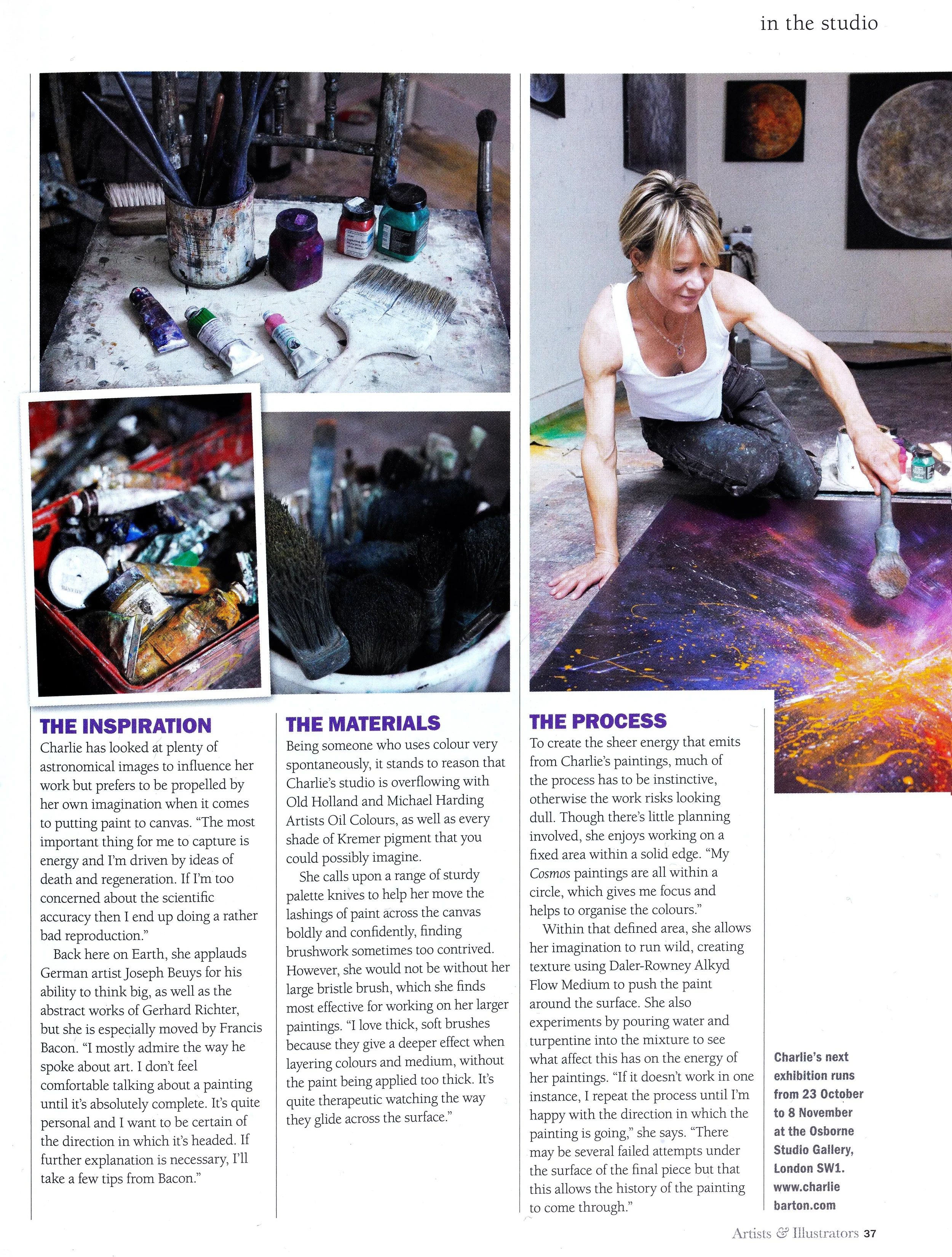 Photograph of an art studio with a woman sitting on the floor painting on a large canvas with vibrant colors, surrounded by paintings of celestial bodies on the wall.