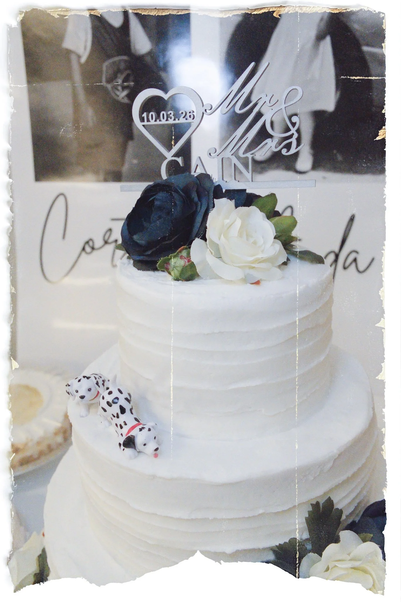 White wedding cake with dark florals, wedding photography in Columbus, GA