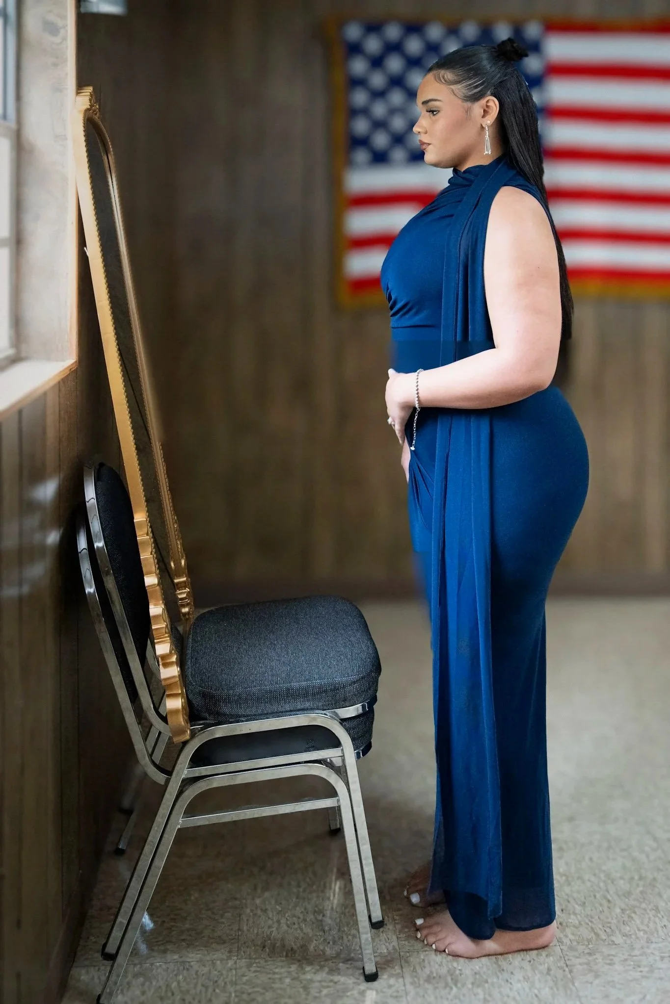 Candid moment of a bridesmaid in a navy dress