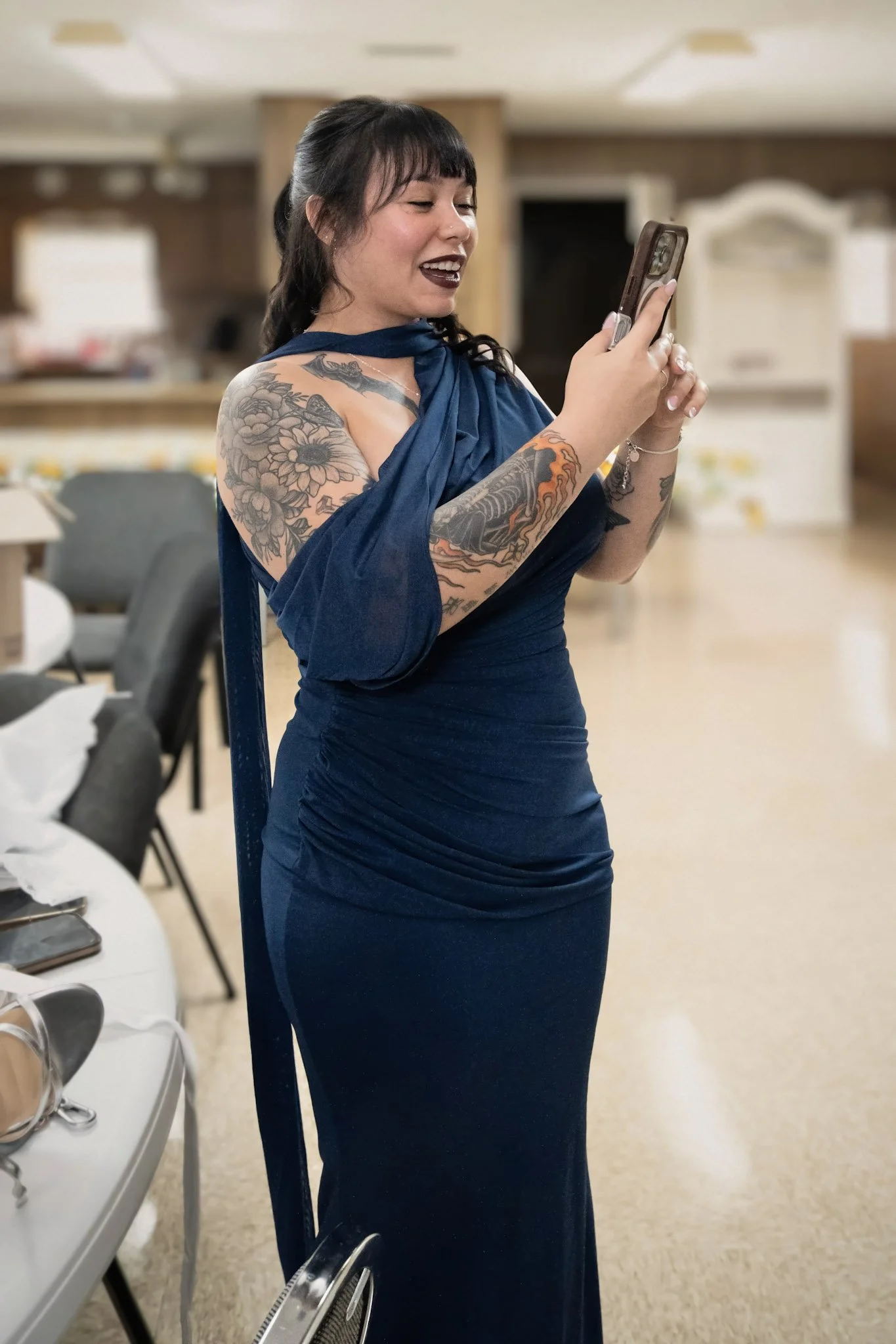 Bridesmaid in a navy dress, candid portrait