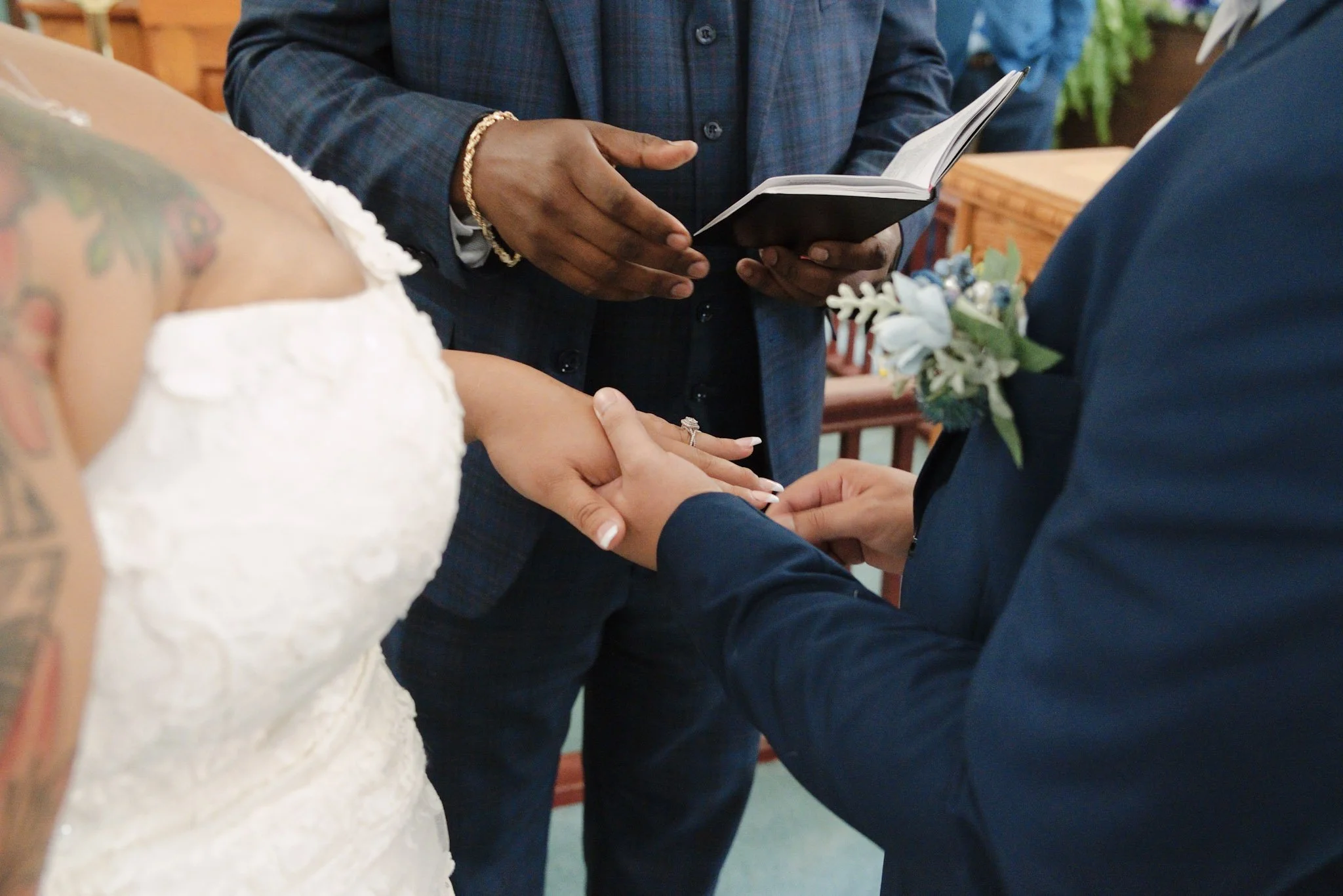 Close-up of the ring exchange during a wedding ceremony