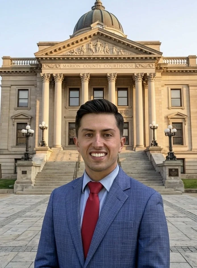 Nicholas Perone, criminal defense and car accident lawyer at King & Perone, in front of the Marion County Courthouse in West Virginia