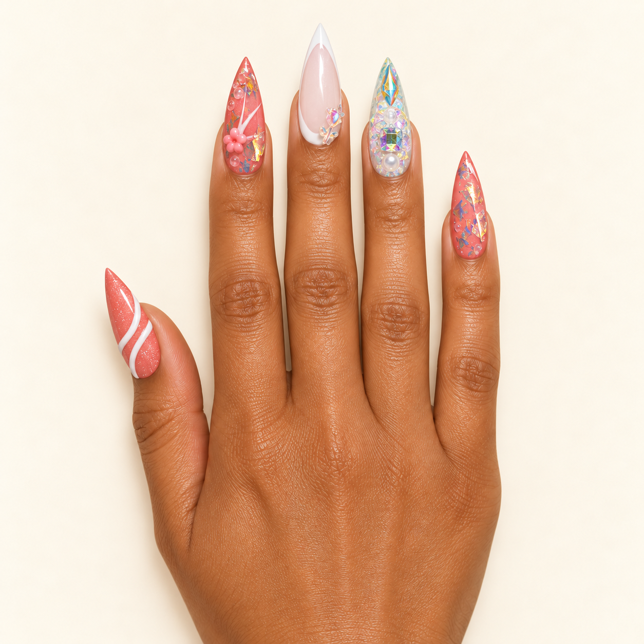 Pretty Pixie coral stiletto manicure.png