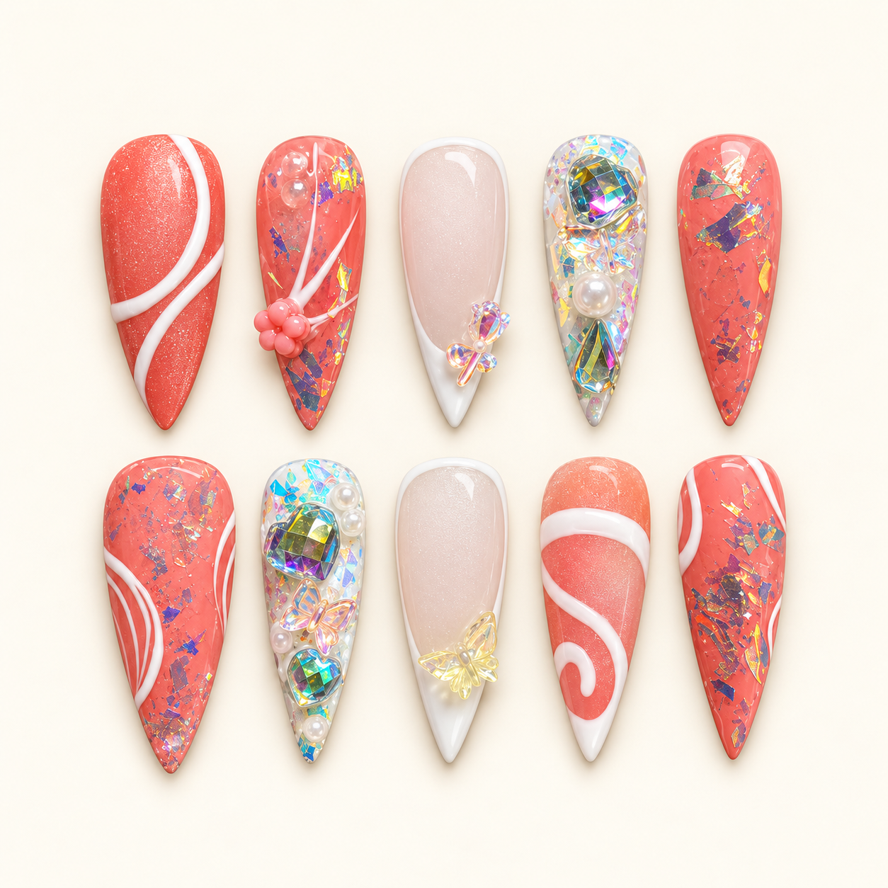Ten jeweled coral press-on nails.png