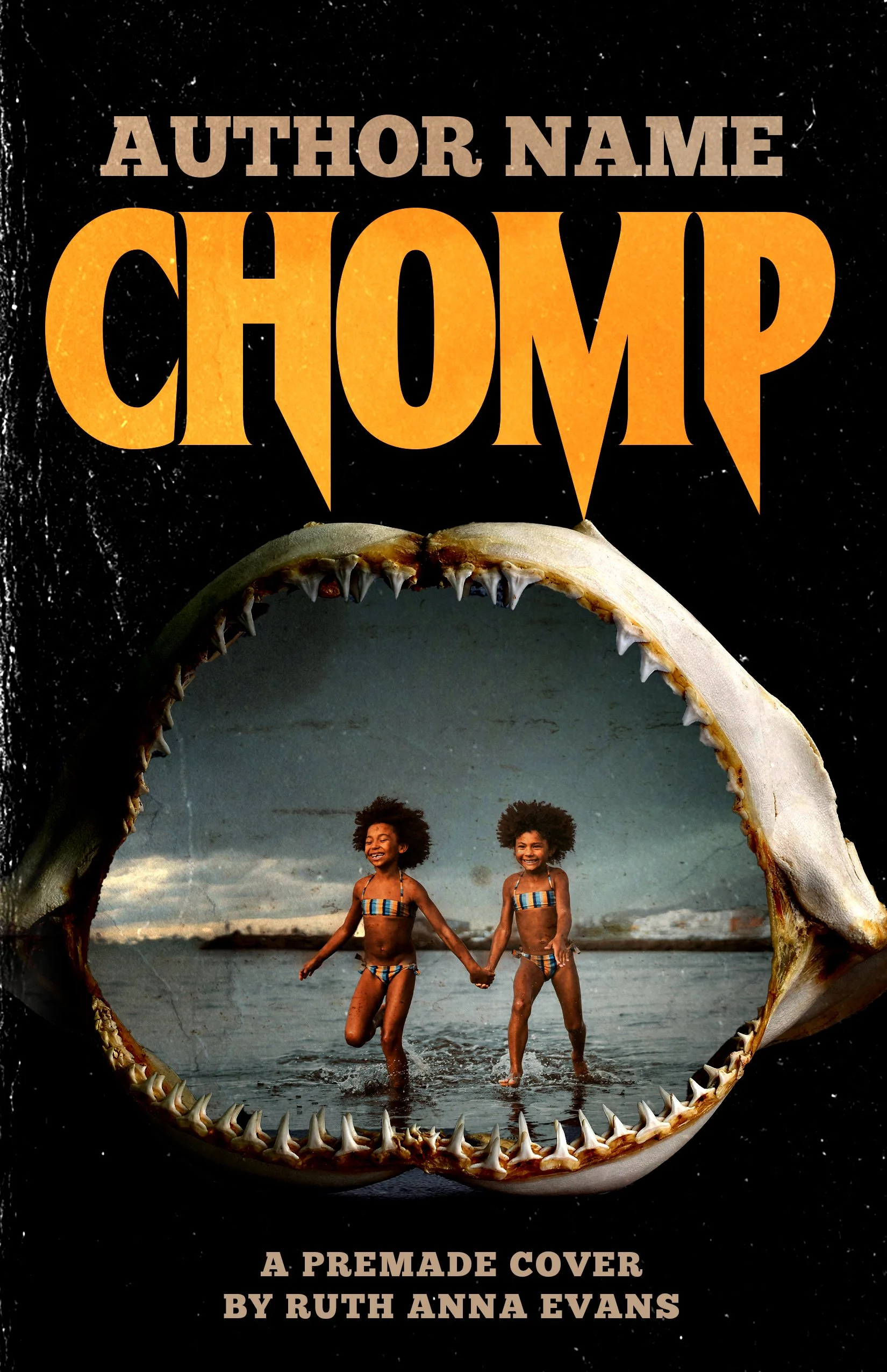 Two young girls in swimsuits holding hands and running along the beach, framed inside a large shark's open mouth.