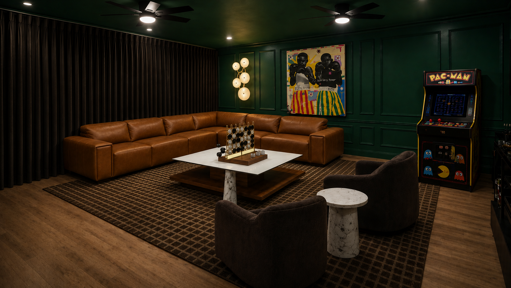 A game room featuring a large brown leather sectional sofa, a white marble and wooden coffee table with a Connect Four game, two dark gray armchairs, a Pac-Man arcade machine, a wall painting with Black Panther characters, and modern ceiling lights, with dark curtains and green wall paneling.