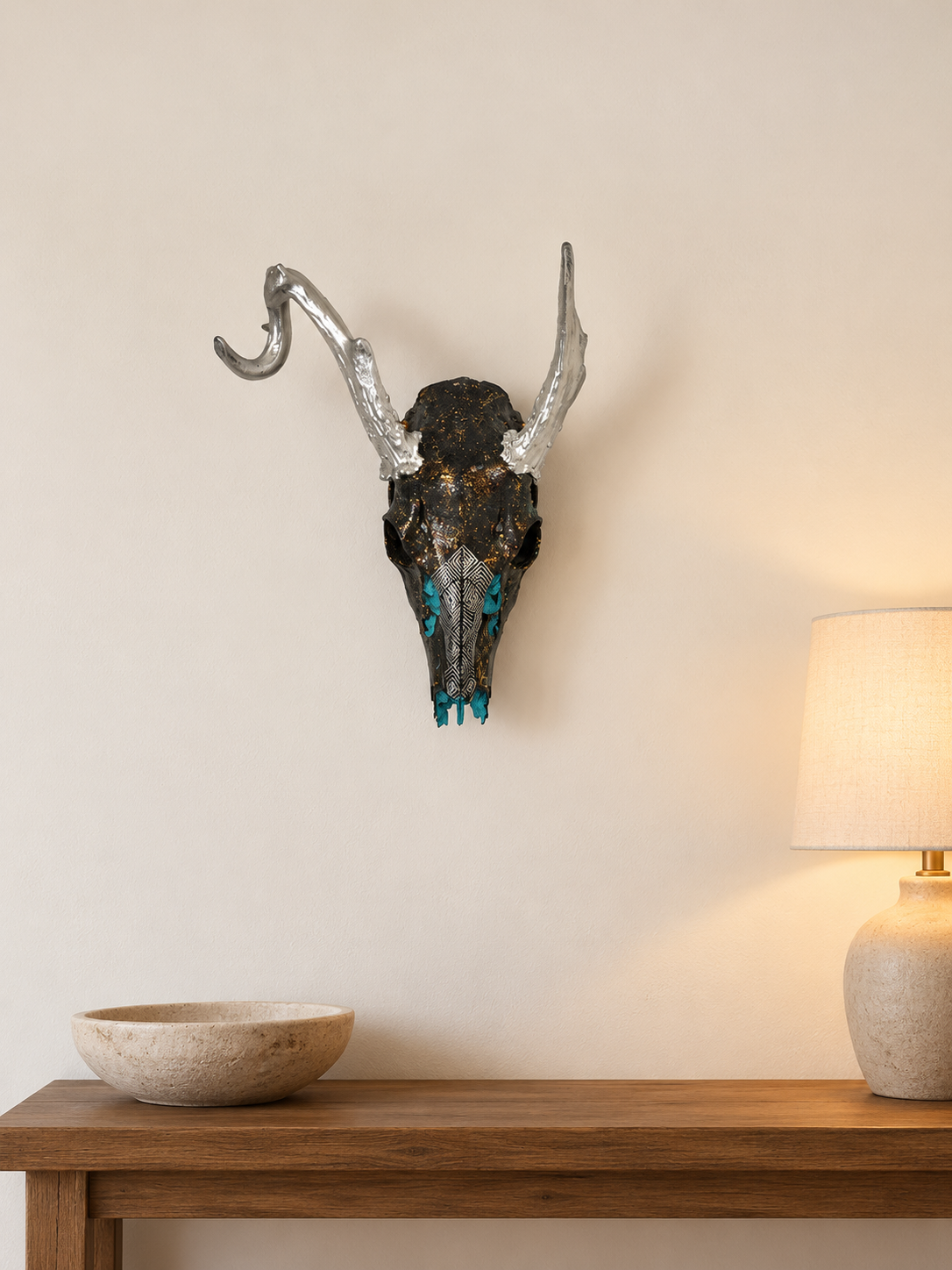 Turquoise geometric deer skull display.png