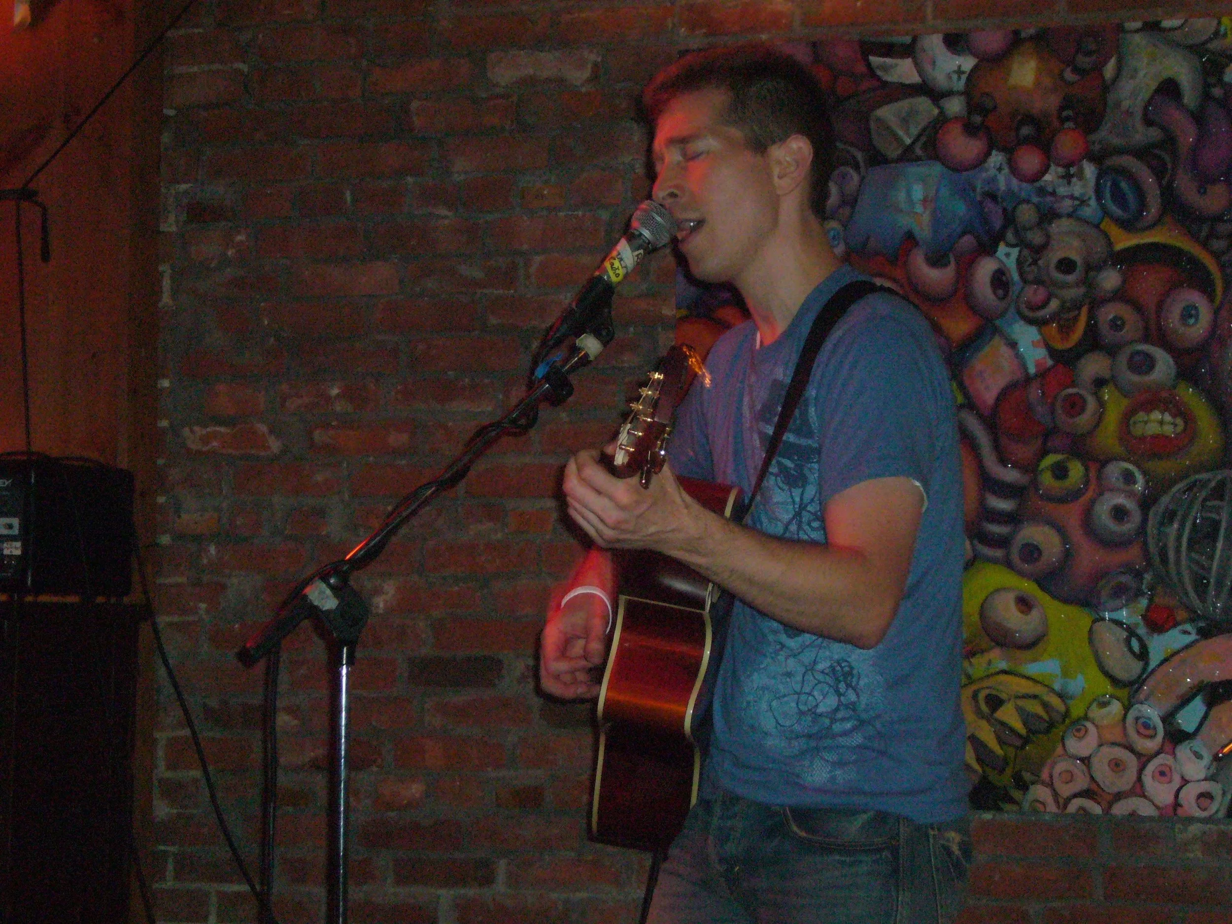 Bet Nun Kogan playing acoustic guitar and singing live many years ago