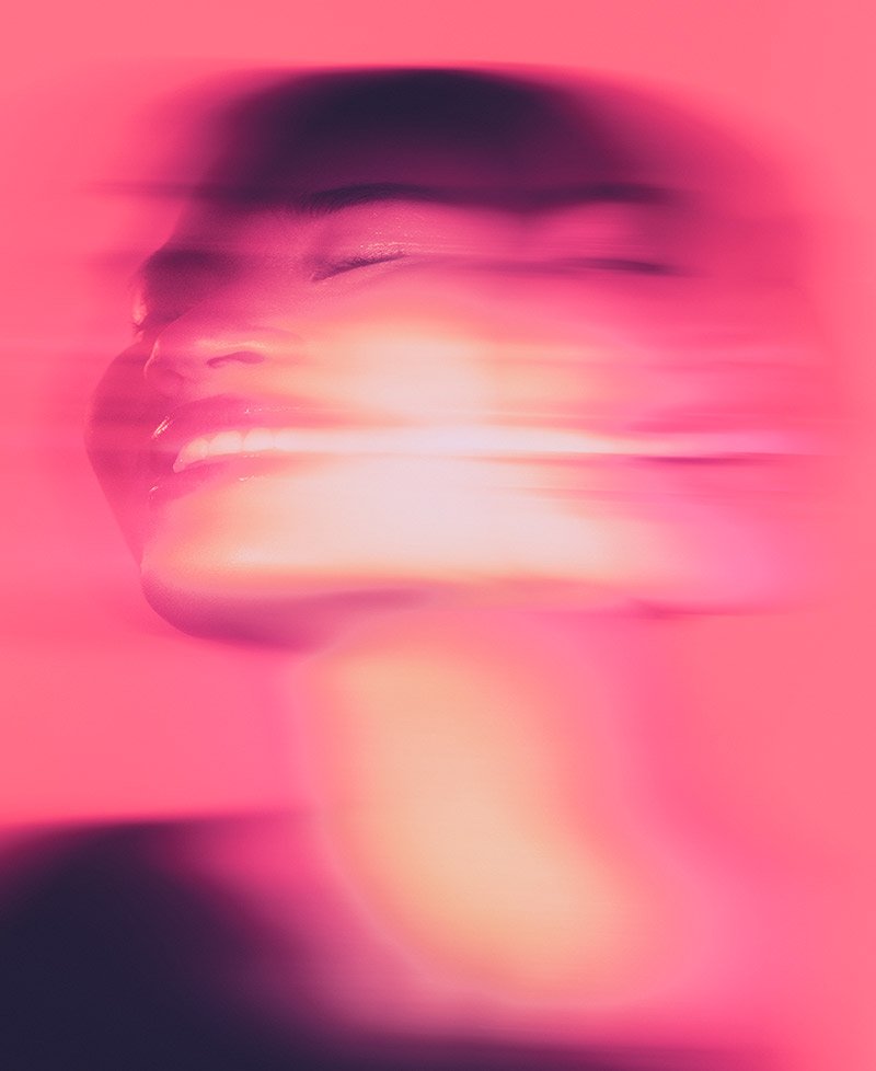 Creative direction for Phlur campaign featuring a motion-blurred beauty portrait in pink tones