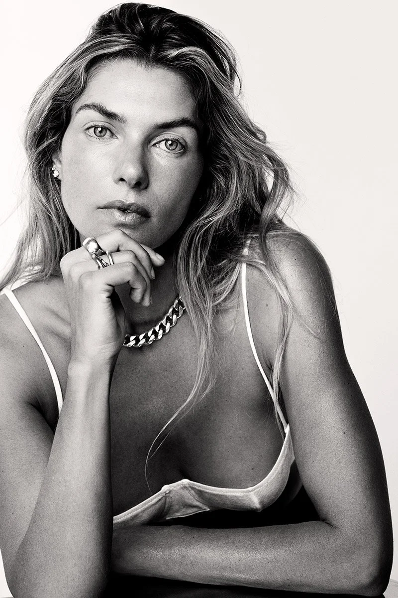 Black-and-white fashion editorial portrait, creative production by Crystal Wooden