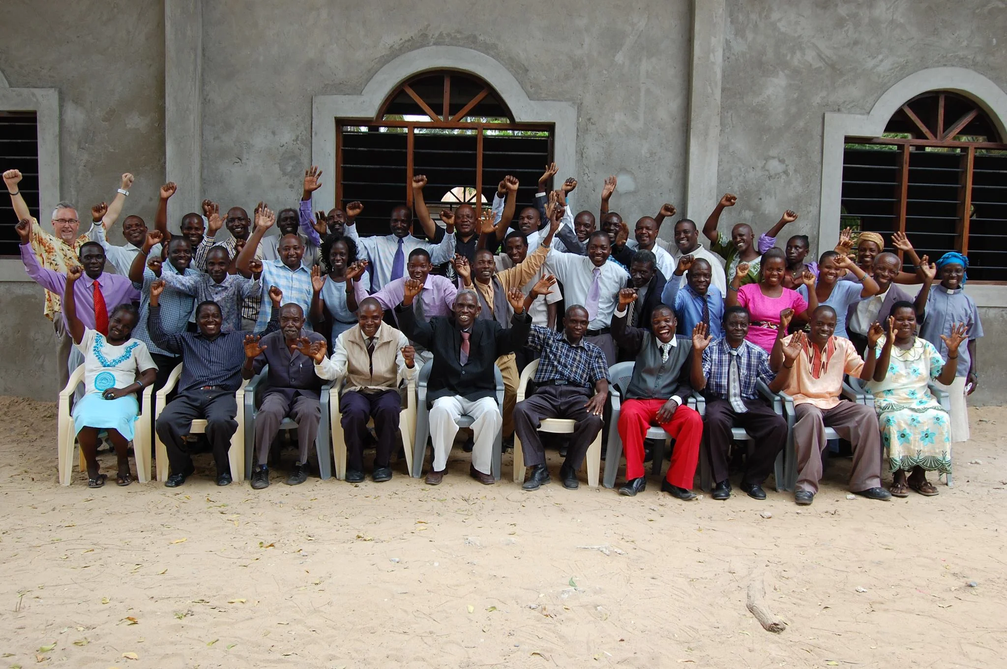 Biblical Life ministry gathering outside a church in Africa