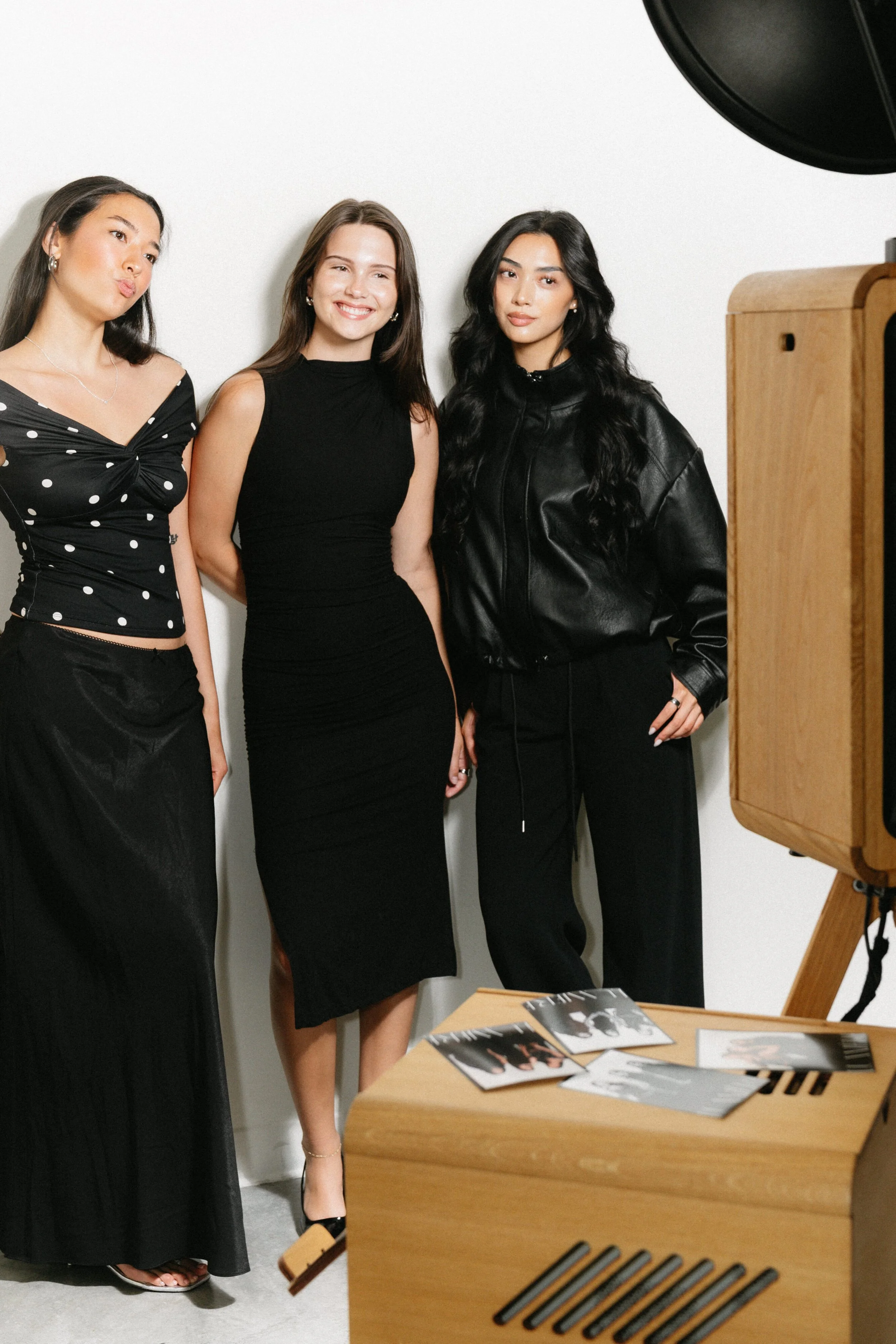 Posing in brand activation photo booth at Southern CA event