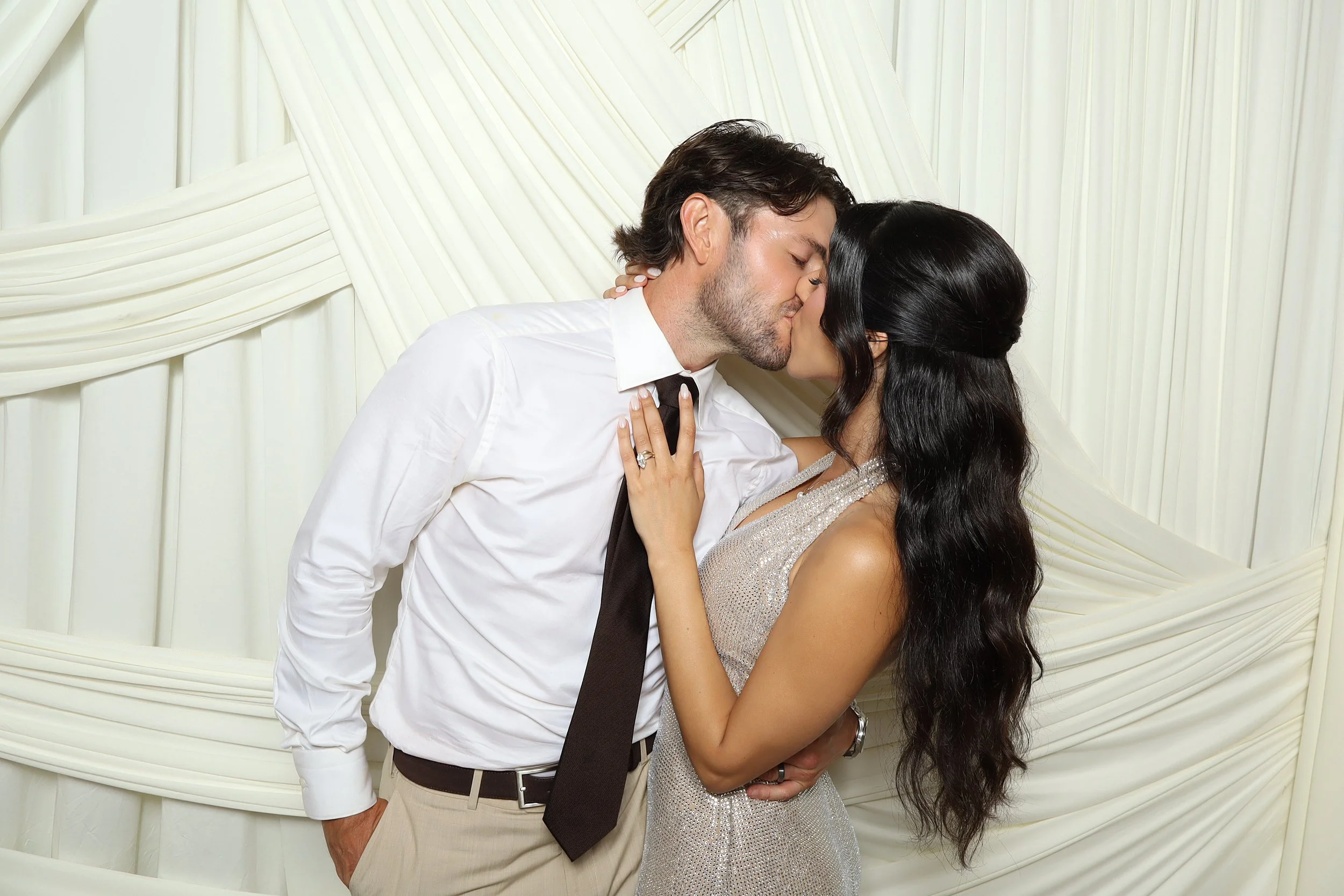 Bride and groom in luxury wedding photo booth at San Diego wedding venue