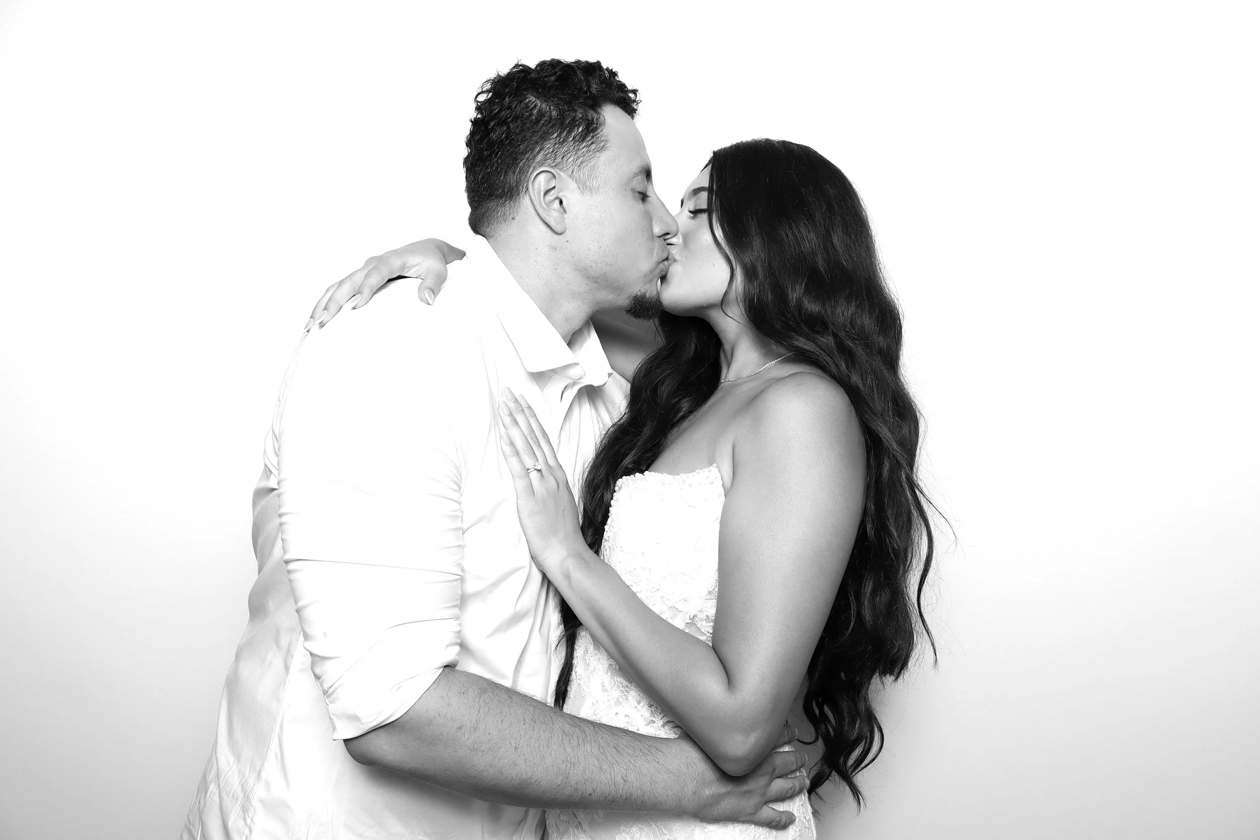 Bride and groom in photo booth in los Angeles