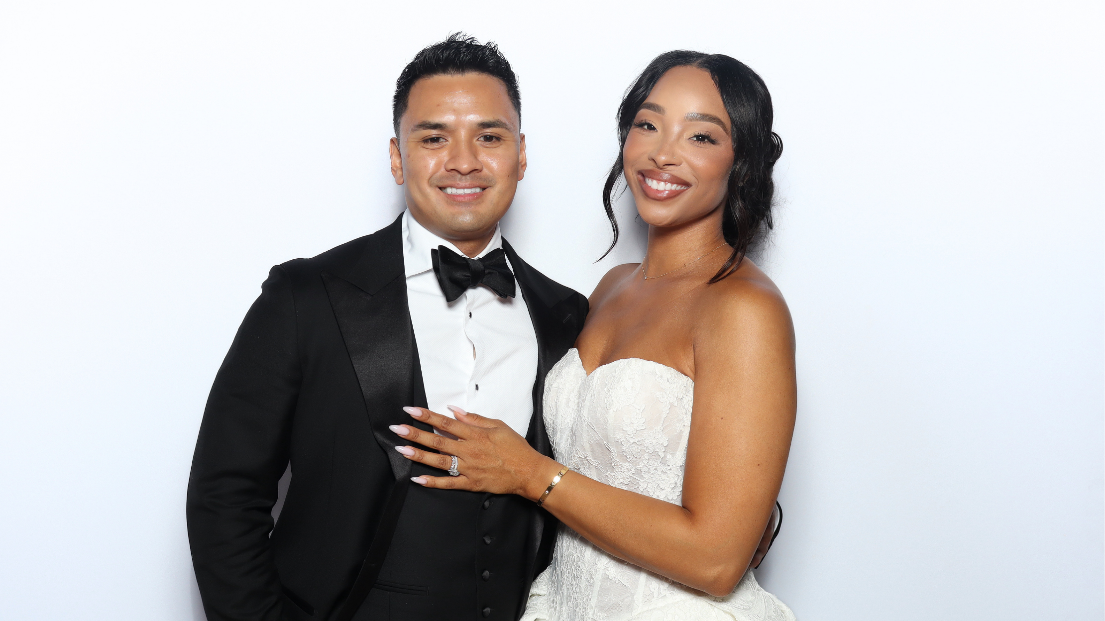 Couple posing for photo booth at San Juan Capistrano wedding