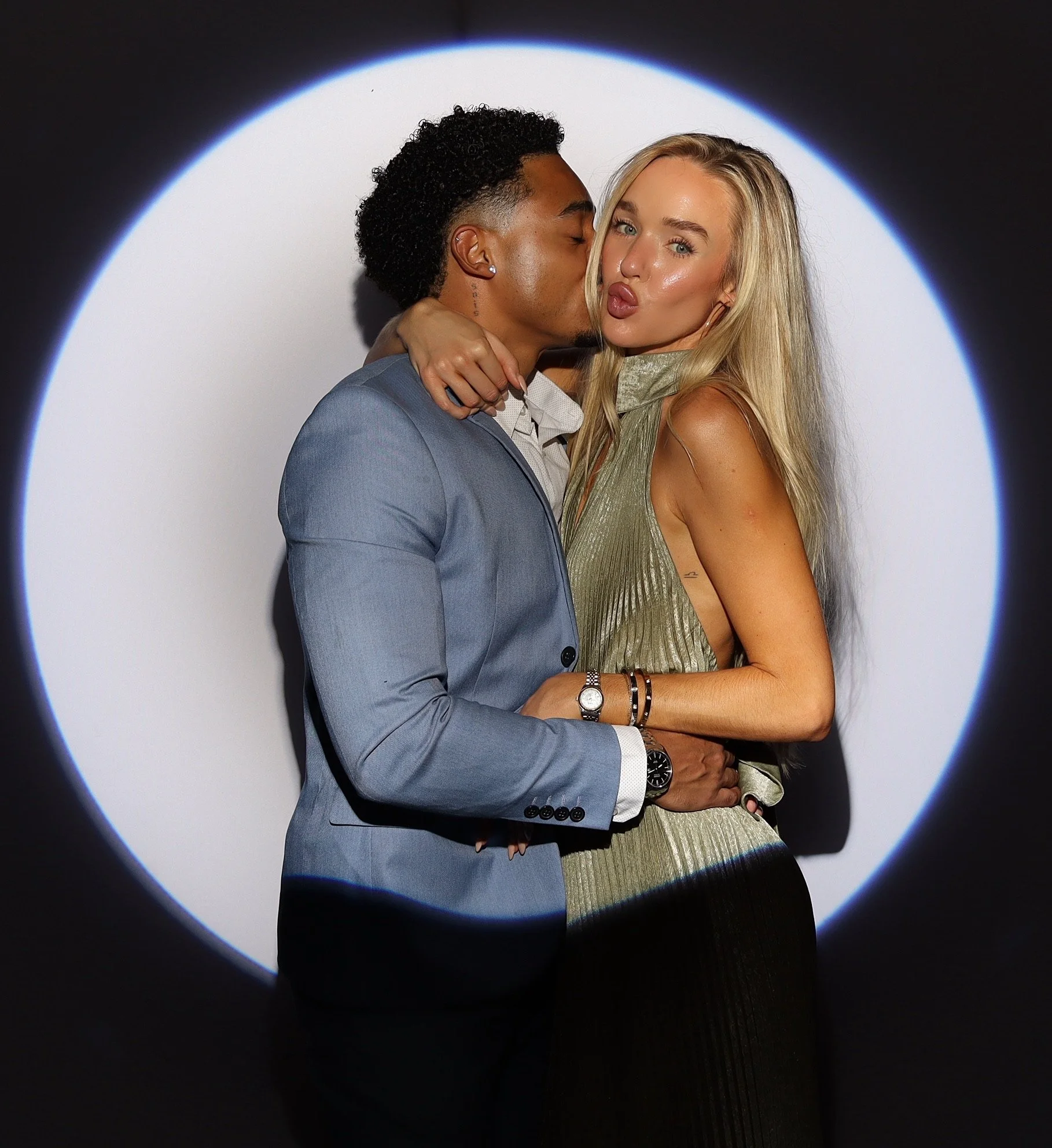 Couple at San Diego wedding posing in luxury photo booth